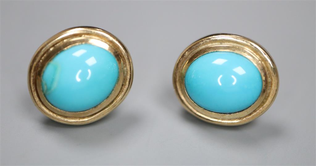 A pair of modern 9ct gold and cabochon turquoise set oval earrings ( one stone a.f., 12mm, gross 5.5 grams.